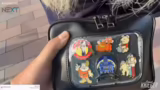 Pin-Trading und Merchandise-S…